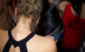 Stripper surrounded by a lot of horny women